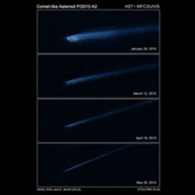 Hubble Finds that a Bizarre X-Shaped Intruder Is Linked to an Unseen  Asteroid Collision