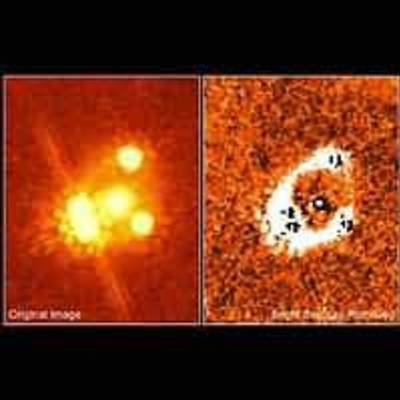 New Research That Uses Gravitationally Lensed Quasars to Measure Universe is Good News, Bad News for Cosmologists