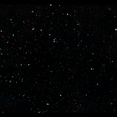 The background is black, but there are hundreds of thousands of tiny shapes scattered all across the scene.