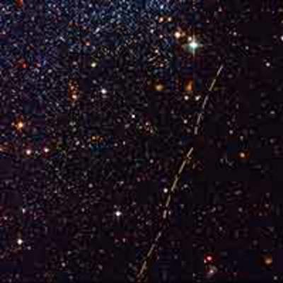 Reddish Arcs Mark Trail of Small Asteroid