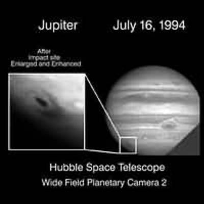 Comet Shoemaker-Levy's First Fragment Impacts With Jupiter