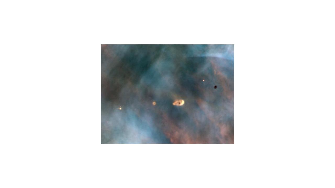 Several “proplyds” in the Orion nebula