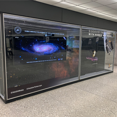 Vitrine at Dulles International featuring Webb and Hubble
